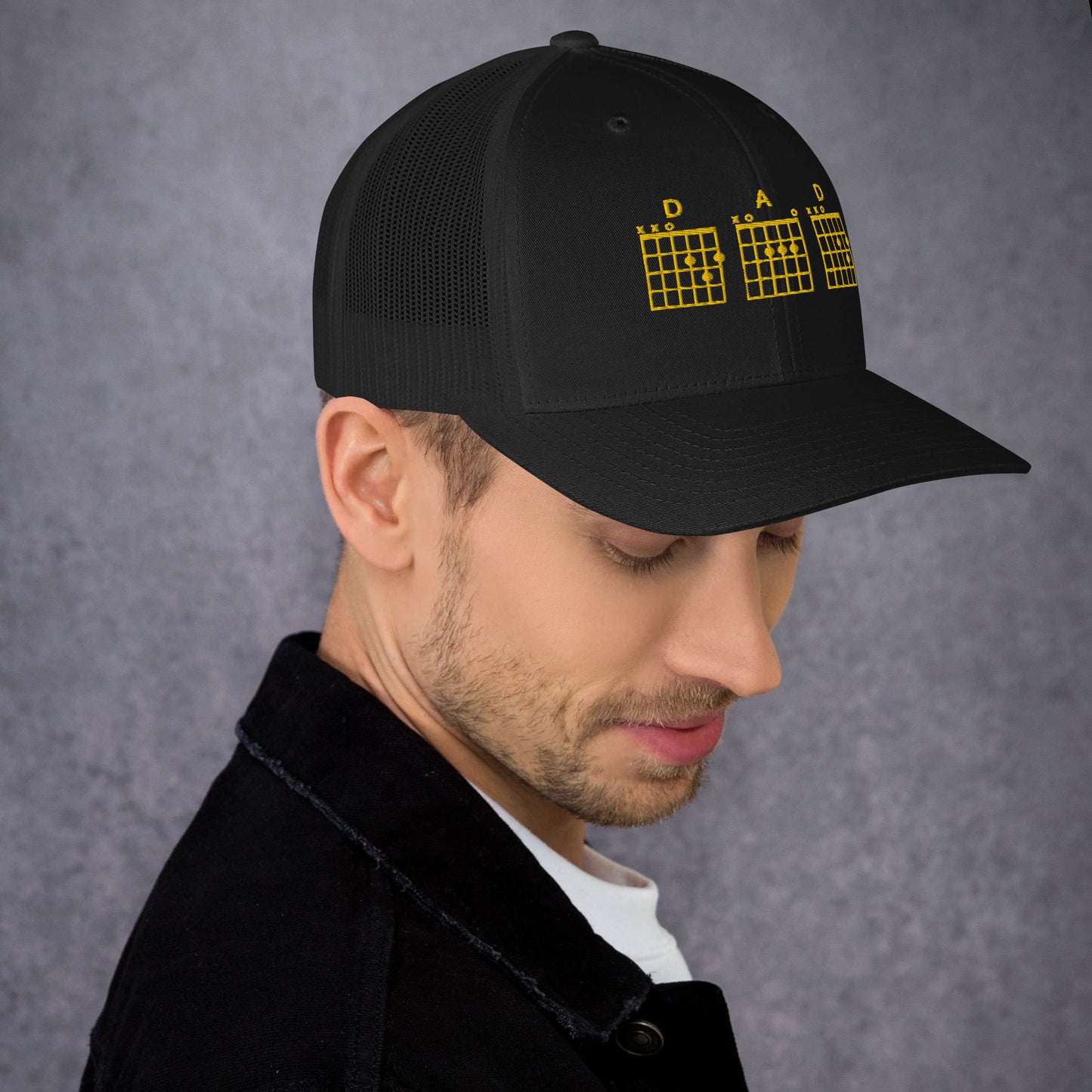 D A D Chords in gold  - Black Trucker Cap